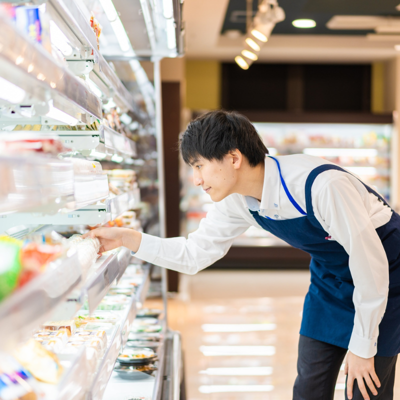 Convenience store checkout counter with retail products