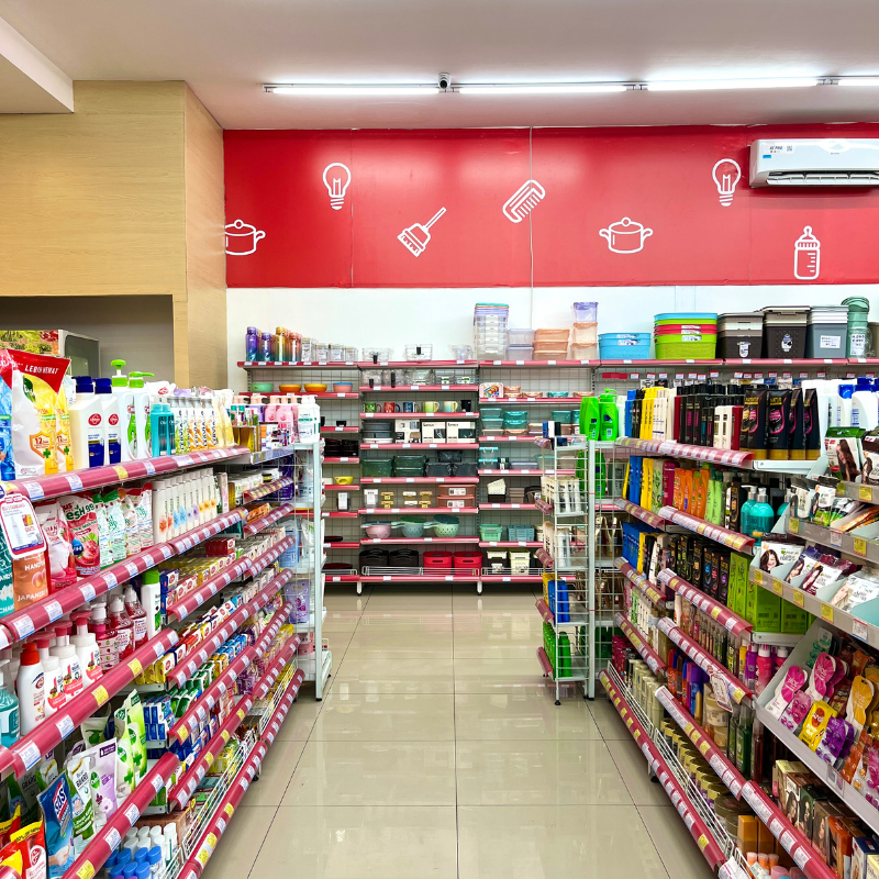 Convenience store fridge with cold drinks and retail shelves